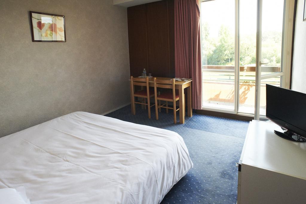 Les Ondines Hotel Les Hauts-d'Anjou Quarto foto